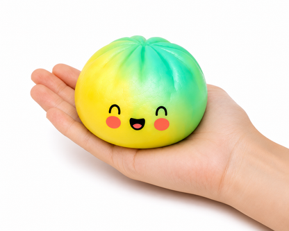 Glitter Edition Dumpling Squishy - rainbow dumpling squishy held in a hand